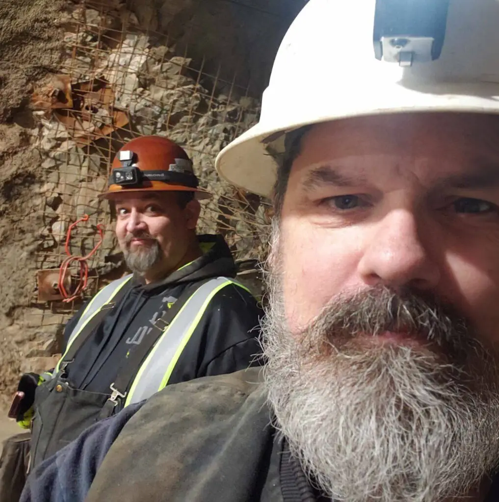 Jason Todd and Josh Walton pose in underground mine.